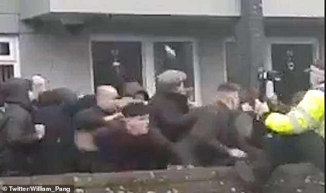 Footage appears to show the moment the fan was slashed by a blade during a mass brawl between Everton and Millwall fans 