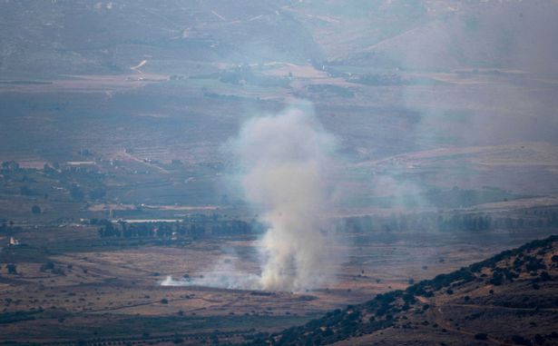 Israeli forces used artillery fire as a smokescreen while battling Hezbollah at the border