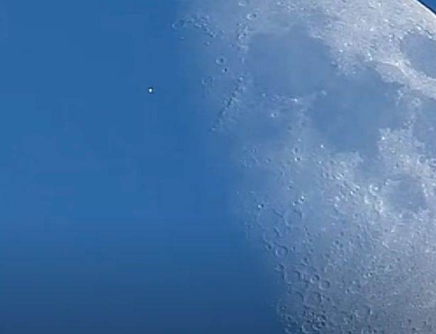 The white or shining object moves left out of the frame