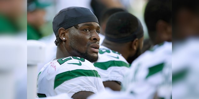 This Sept. 22, 2020, file photo shows former New York Jets running back Le'Veon Bell watching from the sideline near the end of the second half of an NFL football game against the New England Patriots, in Foxborough, Mass. (AP Photo/Steven Senne, File)