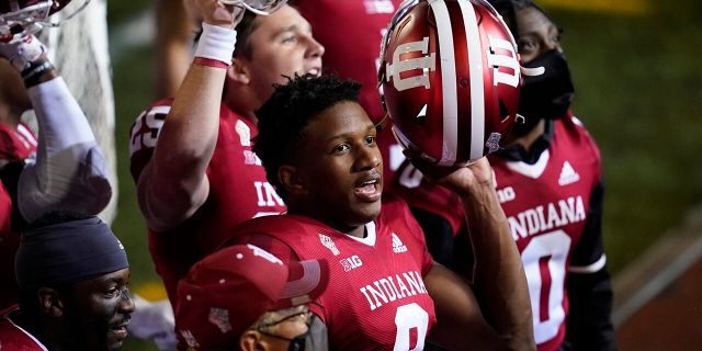 Indiana quarterback Michael Penix Jr. (9) celebrates after Indiana defeated Penn State in overtime of an NCAA college football game, Saturday, Oct. 24, 2020, in Bloomington, Ind. Indiana won 36-35. (AP Photo/Darron Cummings)