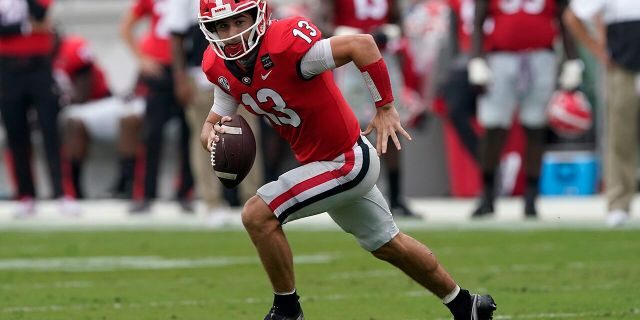 No. 5 Georgia has had an off week to prepare for Saturday's game at Kentucky after being shut out in the second half of a 41-24 loss to No. 2 Alabama. With Stetson Bennett expected to retain the starting job at quarterback, the Bulldogs are relying on their running game led by Zamir White to get the offense moving again. (AP Photo/John Bazemore)