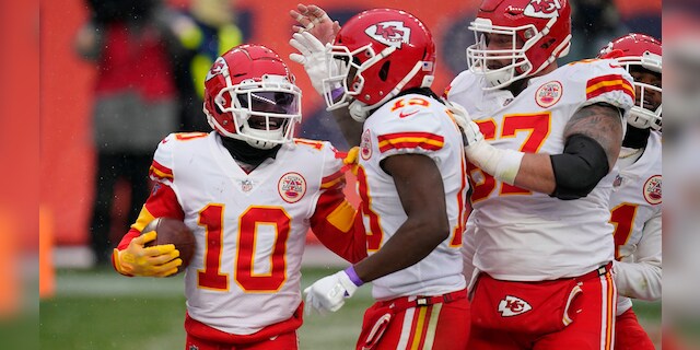 Kansas City Chiefs wide receiver Tyreek Hill (10) reacts with teammates after scoring a touchdown during the second half of an NFL football game against the Denver Broncos, Sunday, Oct. 25, 2020, in Denver. (AP Photo/David Zalubowski)