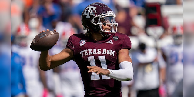 Texas A&amp;M quarterback Kellen Mond (11) passes down field against Florida during the second half of an NCAA college football game, Saturday, Oct. 10, 2020. in College Station, Texas. (AP Photo/Sam Craft)