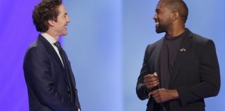 Kanye West, right, answering questions from Joel Osteen earlier Sunday in Houston. (Associated Press)