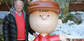 This 2015 photo provided by Jason Mendelson shows Lee Mendelson in Hillsborough, Calif. Lee Mendelson, the producer who changed the face of the holidays when he brought "A Charlie Brown Christmas" to television in 1965 and wrote the lyrics to its signature song, "Christmas Time Is Here," died on Christmas Day, Wednesday, Dec. 25, 2019. (Jason Mendelson via AP)