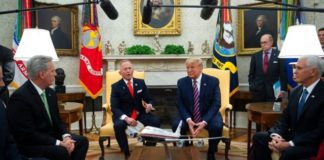 President Trump listens as Rep. Jeff Van Drew, D-N.J., who is planning to switch his party affiliation, speaks during a meeting in the Oval Office of the White House, Thursday, Dec. 19, 2019, in Washington. From left, House Minority Leader Kevin McCarthy of Calif., Van Drew, Trump, and Vice President Mike Pence. (AP Photo/ Evan Vucci)
