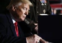 Trump signs $1.4T spending bill that includes Space Force, avoids shutdown President Donald Trump signs the National Defense Authorization Act for Fiscal Year 2020 at Andrews Air Force Base, Md., Friday, Dec. 20, 2019. (AP Photo/Andrew Harnik)